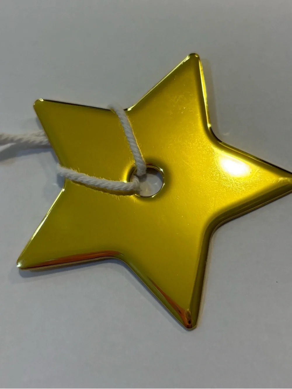 Dior Metallic Gold Star Tag with White Cord